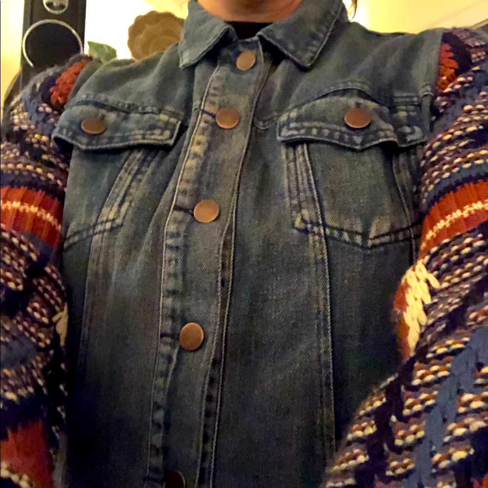 Denim jacket with knit sleeves